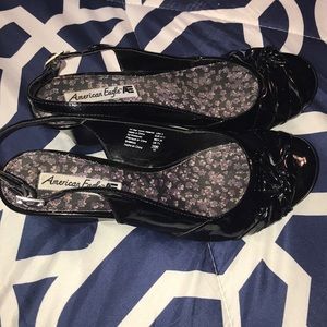 Patent leather black sling back size 9